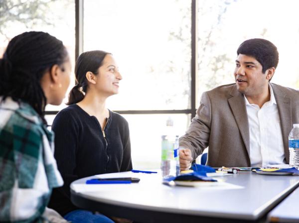 students talking during a conference