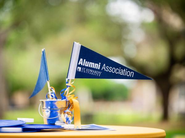  A pennant reads Alumni Association St. Edward's University.