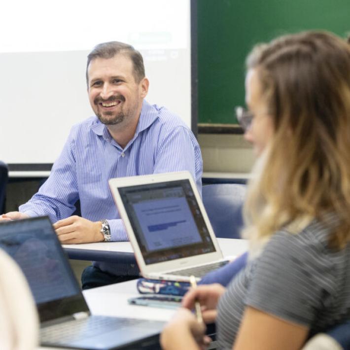 St. Edward's University students and a professor in a Masters in Counseling class