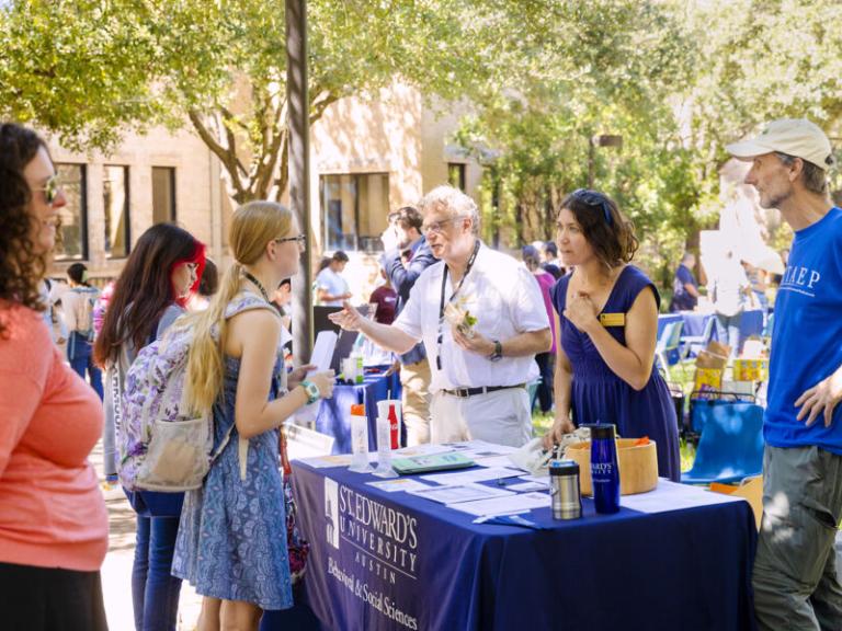 Amy Concilio talks with students about the School of Behavioral and Social Sciences