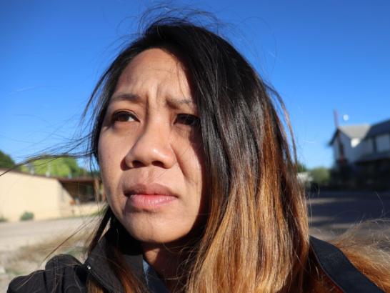 A close-up selfie of a contemplative-looking student