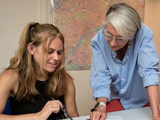 Faculty talking with student