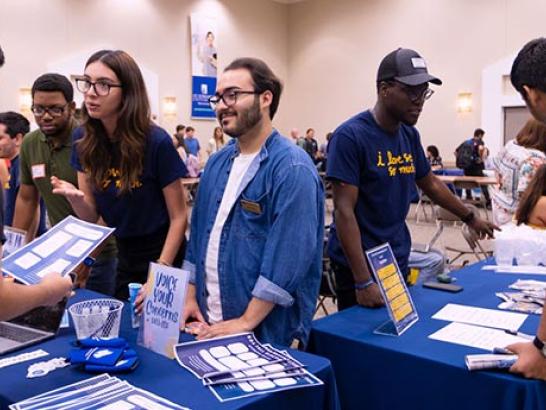 Student Government Association representatives recruit students at the Involvement Fair. 