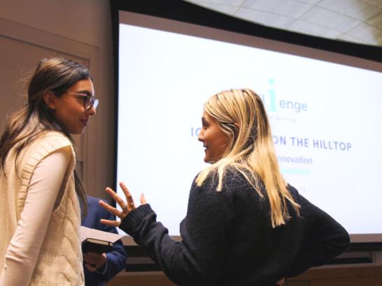 Students discuss their ideas at iChallenge on the Hilltop.
