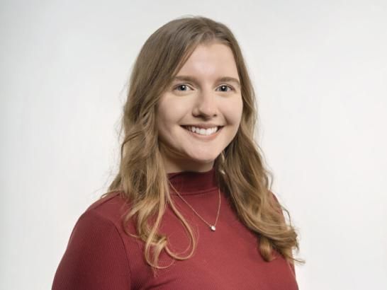 Portrait of Kaitlyn Mills, a financial services counselor at St. Edward's University.