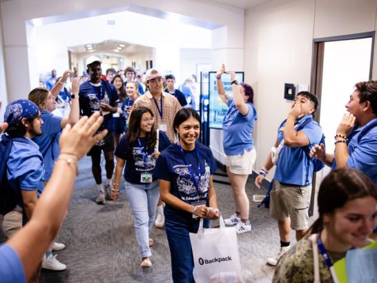 Students cheering at orientation