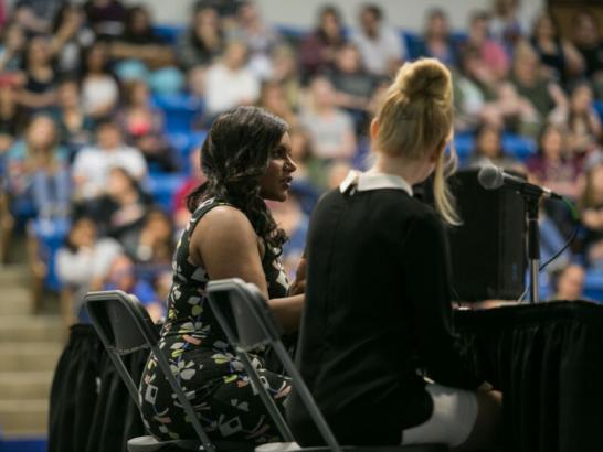 Mindy Kaling sits and speaks to an audience as part of the Marcia Kinsey Visiting Writers Series.