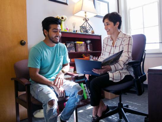 Students meet with financial advisors to go over FAFSA. 