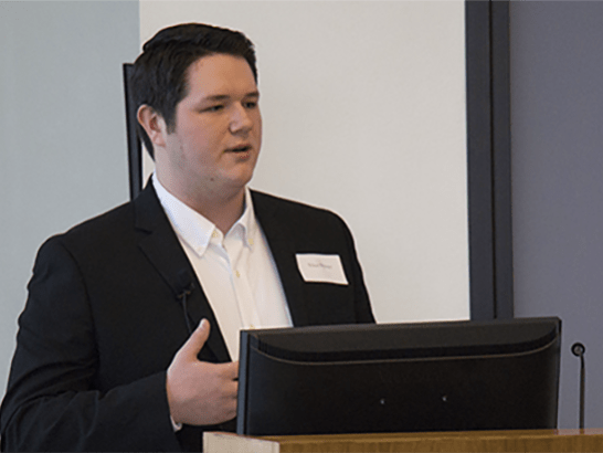 Wilson Whitener speaking at a McNair alumni event