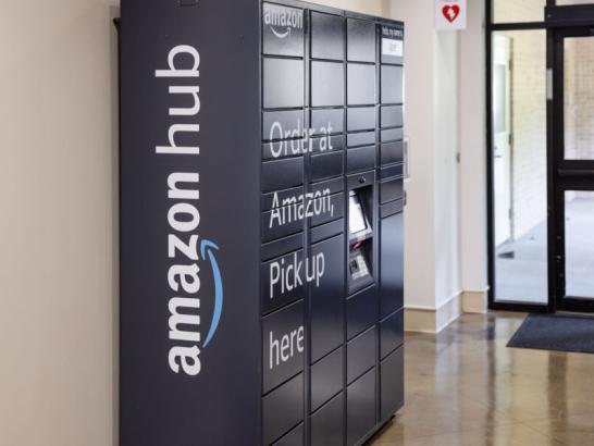 A blue amazon pickup locker on campus