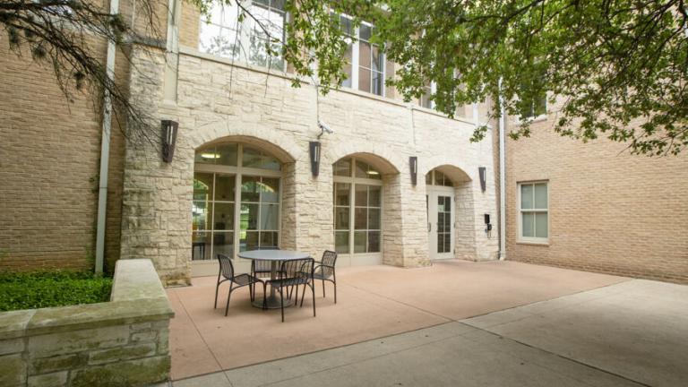 Outside seating area in Basil Moreau Hall