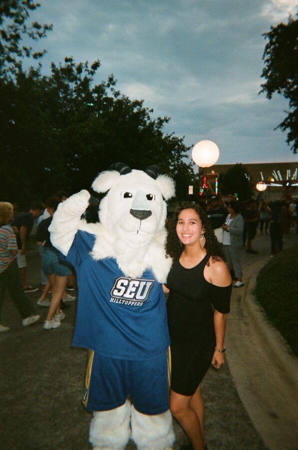 Topper and Nina Rocha stand together outside at Hillfest.