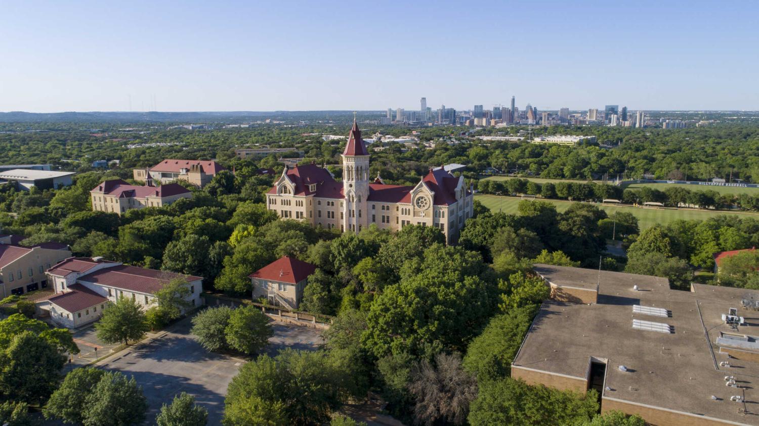 Aerial view of the St. Edward's University campus and downtown Austin skyline