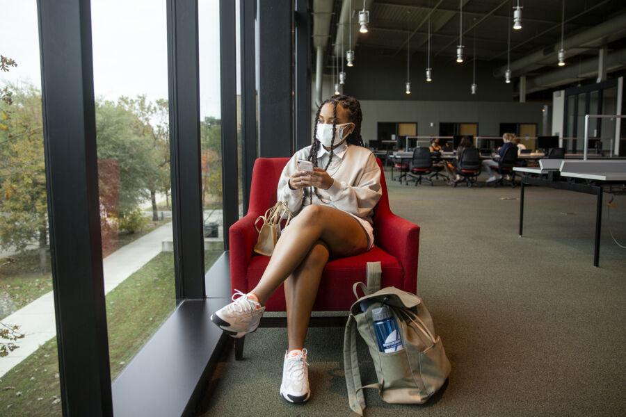 taylor sitting in library