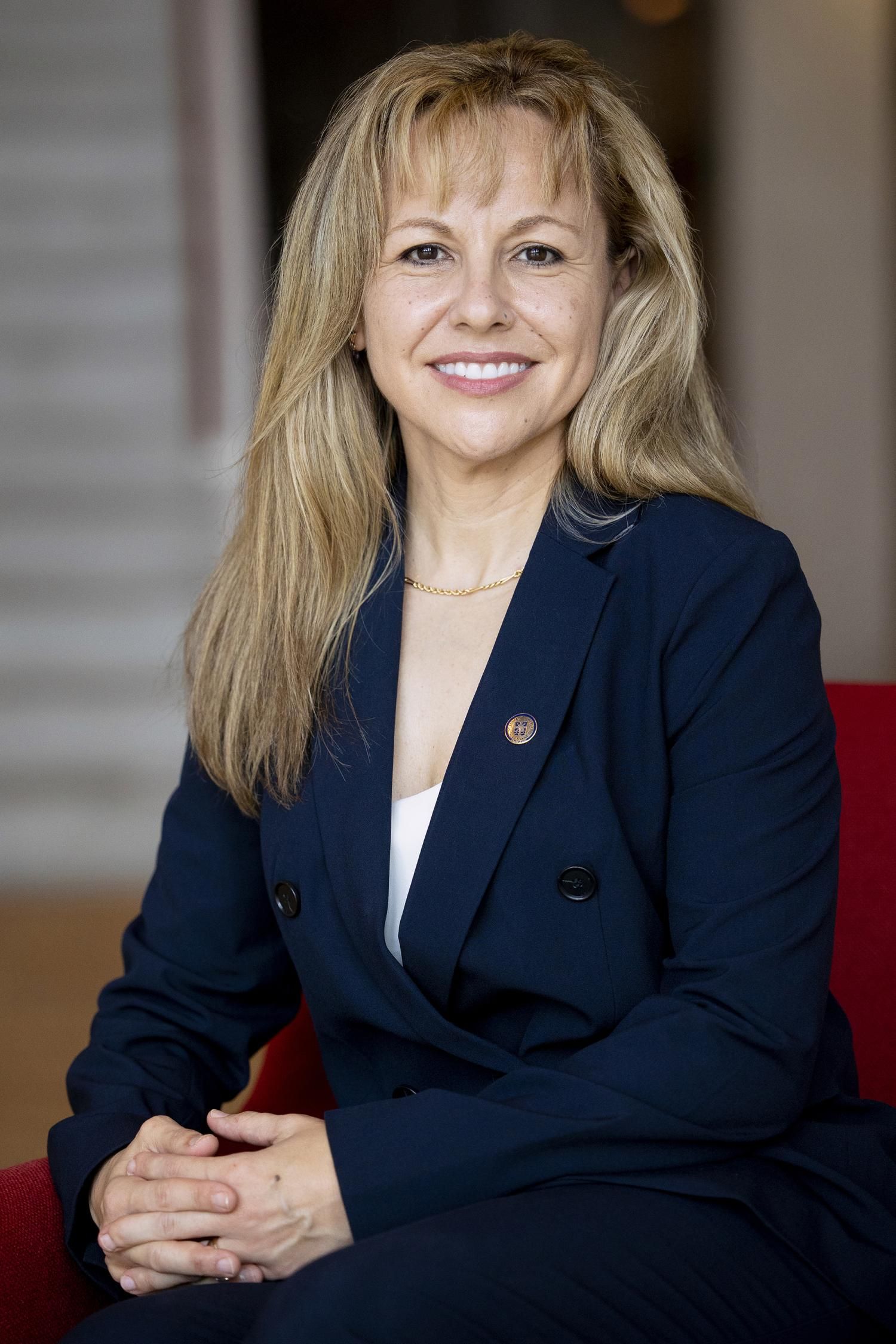 Dr. Montserrat Fuentes sits in the Munday Library set to take on her new role as President of St. Edward's University. 