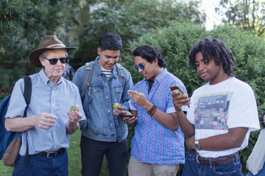 josh with students and professor