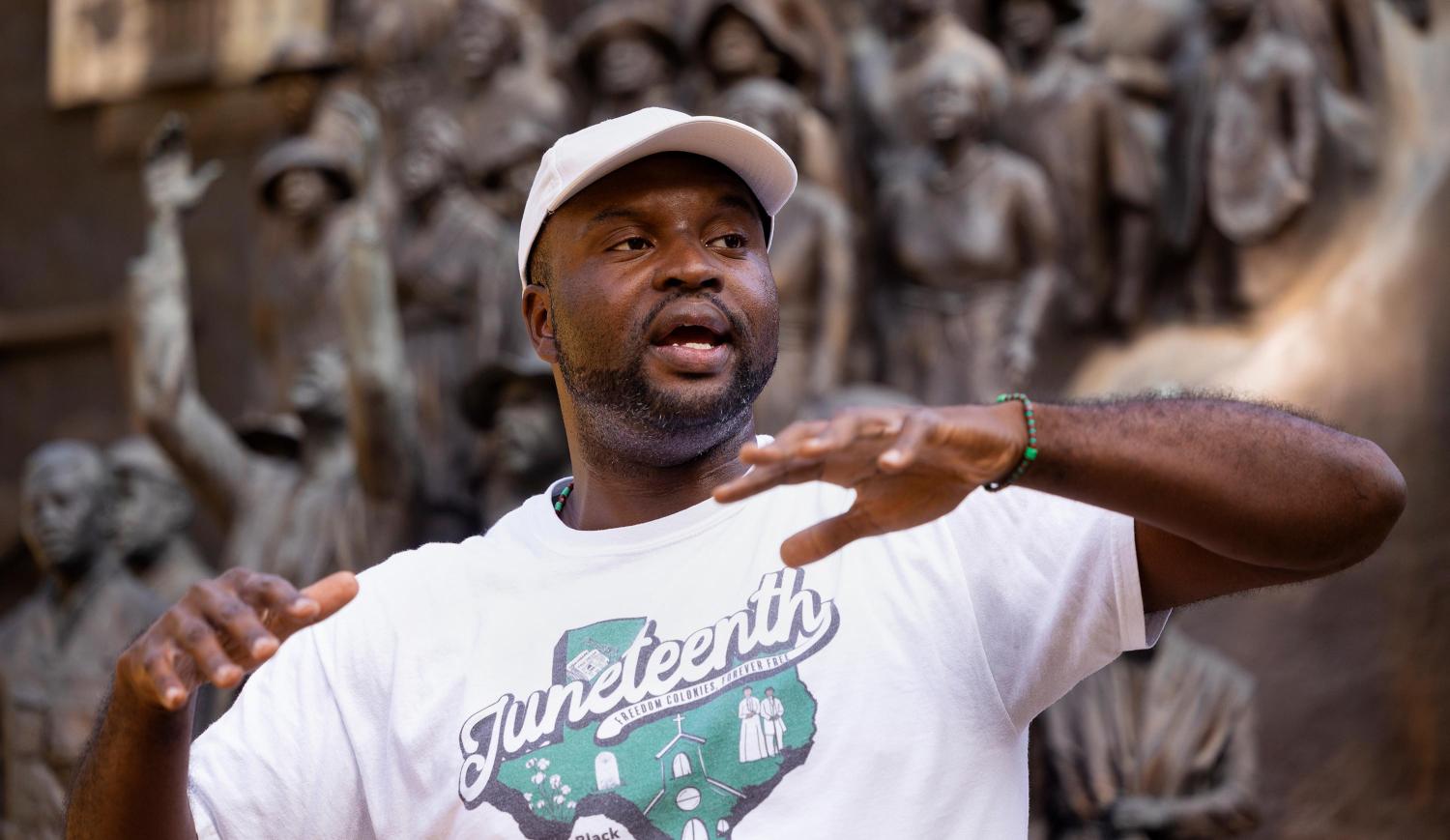 Javier Wallace leading the Black Austin Tour at the State Capitol