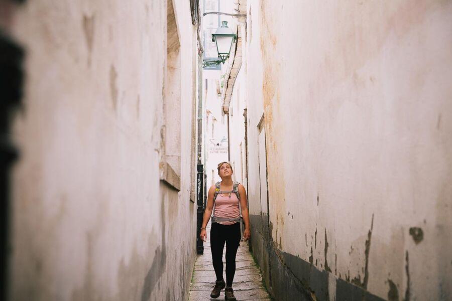 Hannah Thornby walks through small streets and alley ways in Spain