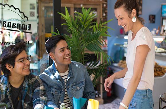 reyes and friends at the empanada factory