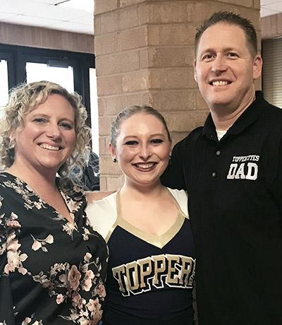 Ashley Stephens and her parents.