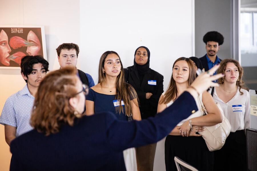 Students are given a tour of the SXSW office in downtown Austin