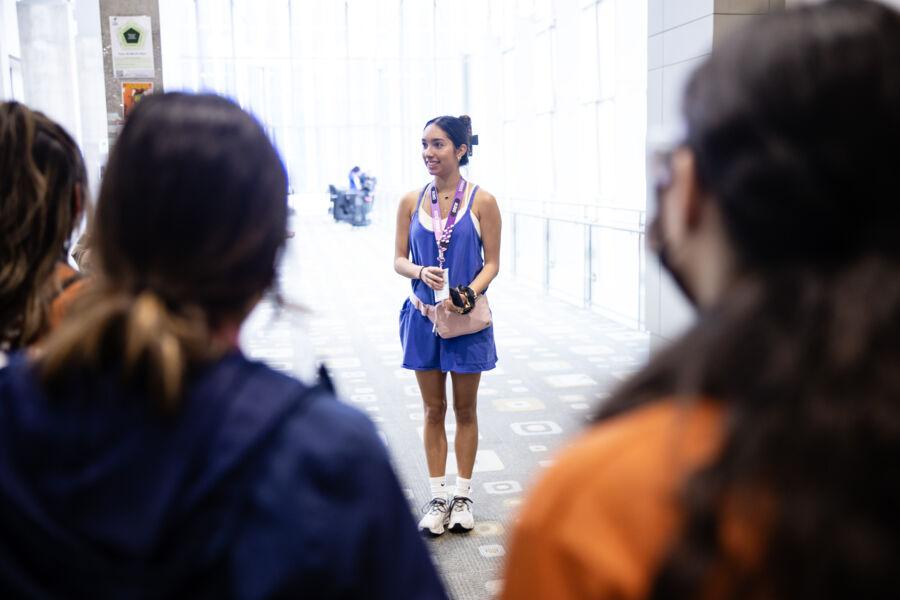 Student, Cressida Rodriguez, talks to SXSW volunteers for her internship