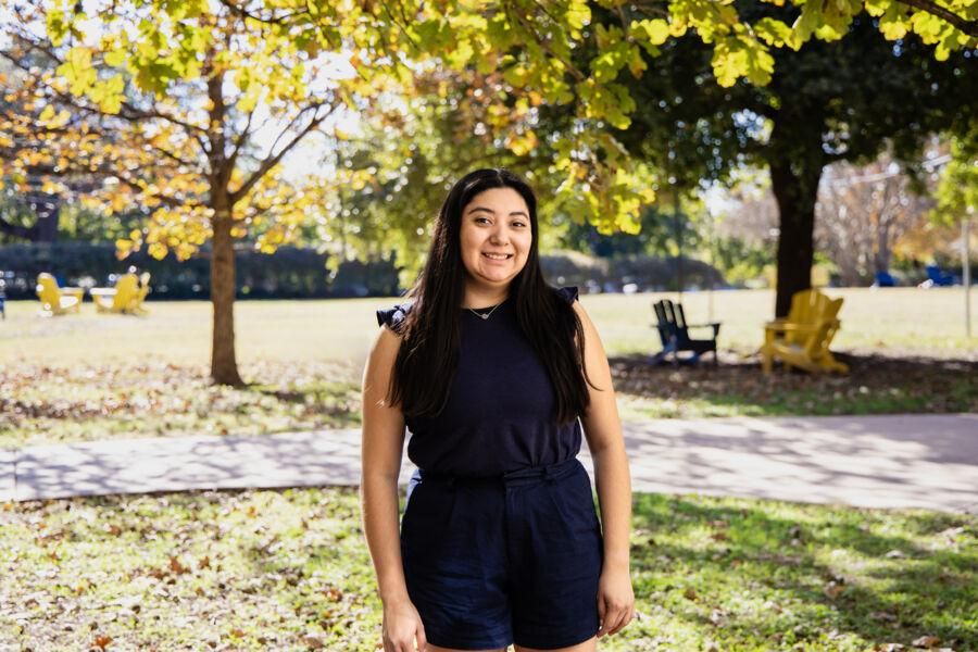 Student Jessica Gallardo poses in front of the Munday School of Business