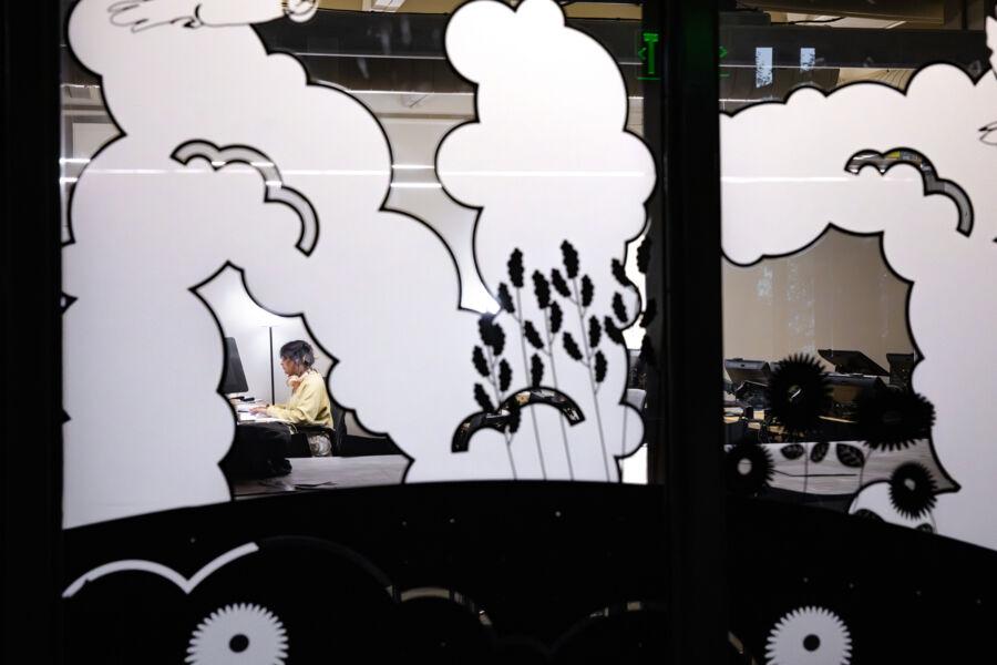 A student studies in the Munday Library